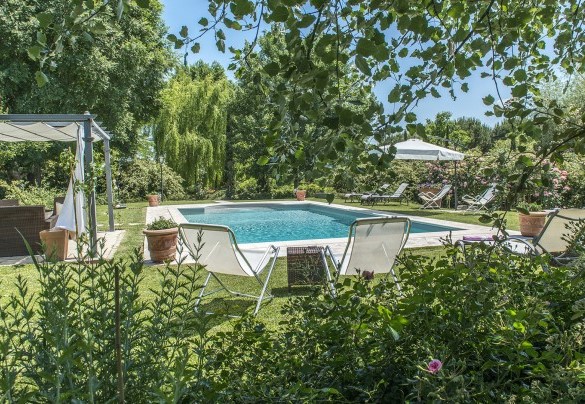 The beautiful pool is positioned at a slightly higher level than the farmhouse - Albachiara 