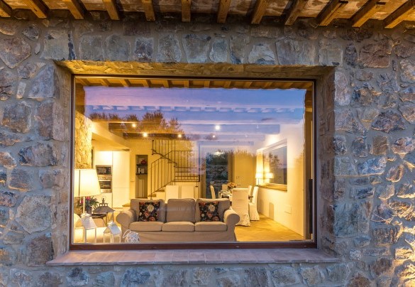 The open space living room of the farmhouse lighted up – Amandula
