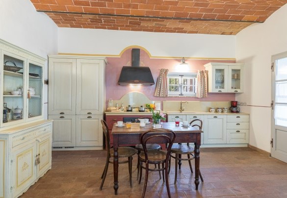 Dining area with kitchenette and living area - Antica Villa Merelli