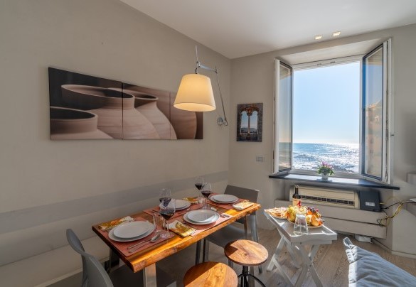 The corner of the living room with the dining table – Aurora