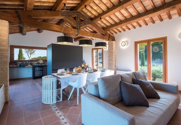 Living area with table set on the ground floor - Borgo da Monte 