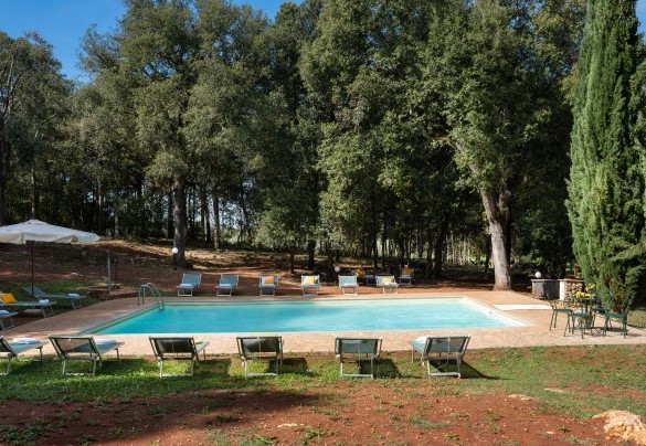 The pool is lined in PVC and bordered by terracotta paving – Borgo Gallinaio
