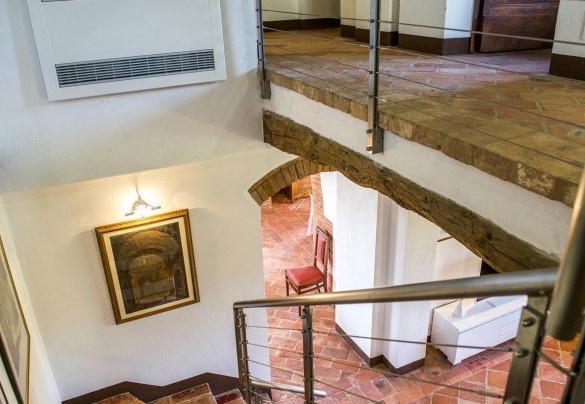 Detail of the original stone staircase with modern railing – Bossoncina 8+1
