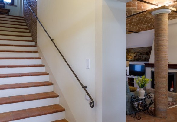 Staircase leading to the double bedrooms on the first floor – Ca’ Pellicciano