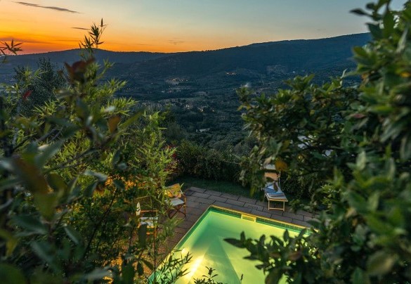  The swimming pool illuminated at night - Casa del Sole