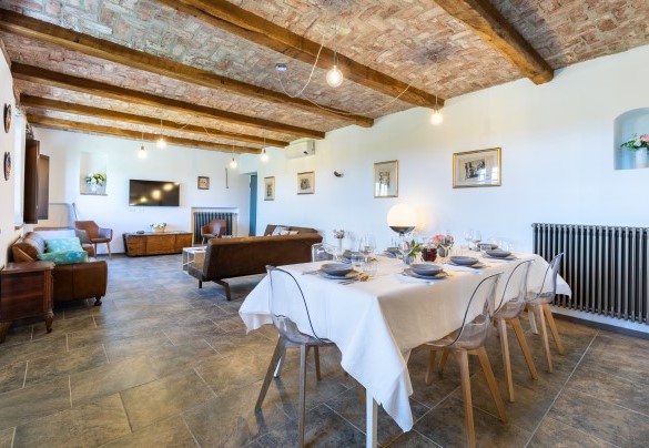 From the main entrance door you enter into the large open space on the ground floor including a dining area - Casa Leonarda