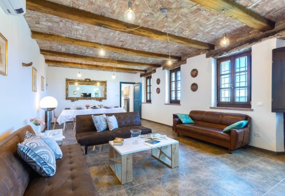 From the main entrance door you enter into the large open space on the ground floor including a dining area - Casa Leonarda