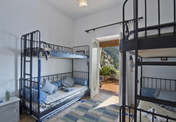 Bedoom n.2 with two bunk beds and direct exit to the panoramic terrace – Casa Noemi 4+2 