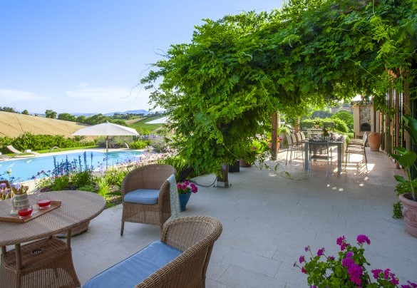 The beautiful pergola shaded by wisteria and adjacent to the kitchen and dining room – Casa Sant'Elia