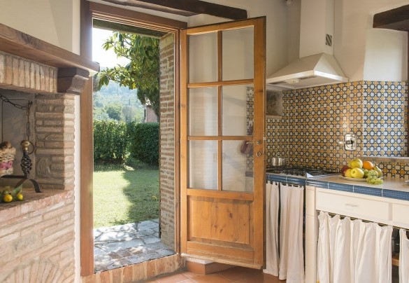 The kitchen has direct access out to the garden at the back - Casa Torrione