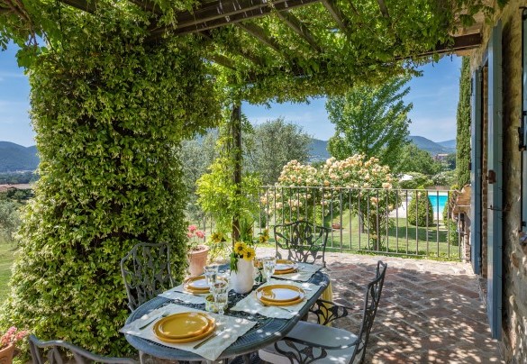 The wisteria-covered portico has direct access from the sitting room - Casal Parro 