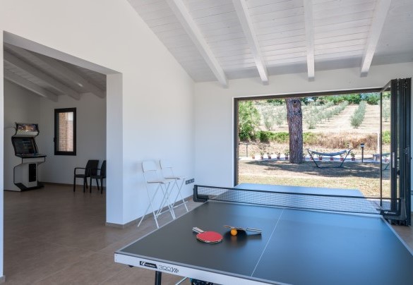 The dependance overlooks the garden and the pool below - Casale Astralis