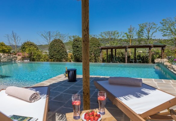 Several sun loungers make up the sunbathing area - Casale Bella Vita