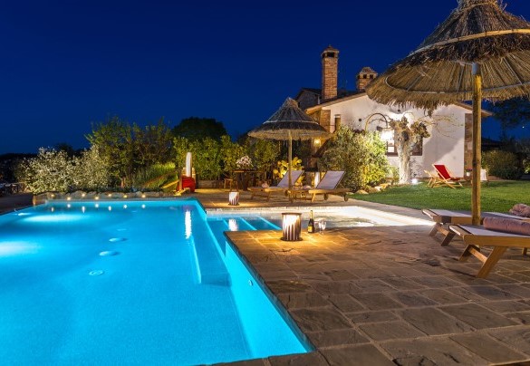 The pool's internal lights create an enchanting atmosphere - Casale Bella Vita