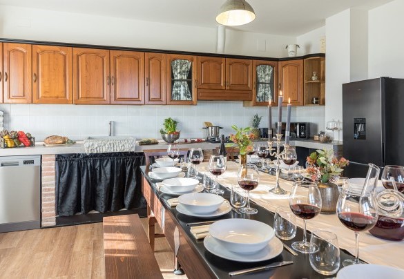 The characteristic dining table inside the kitchen - Casale Bella Vita