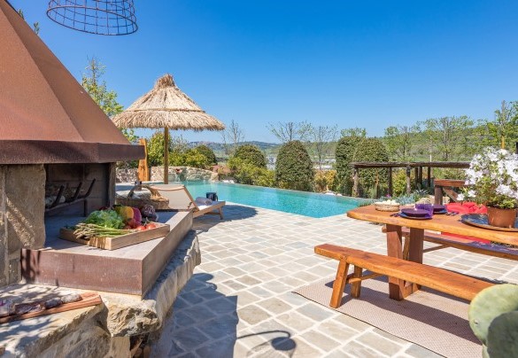 Several seating areas accompany the outdoor kitchen - Casale Bella Vita
