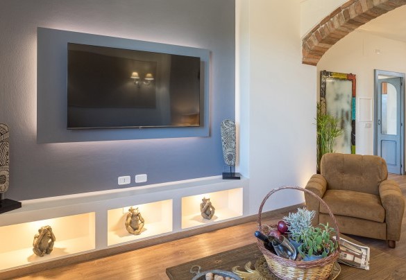 The design living room with a TV - Casale Bella Vita