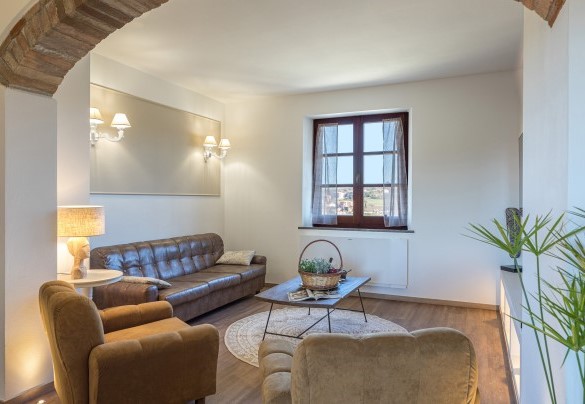 The design living room with a TV - Casale Bella Vita