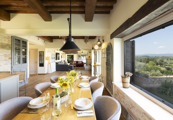 La zona pranzo e il living open - Casale dei Gelsomini 