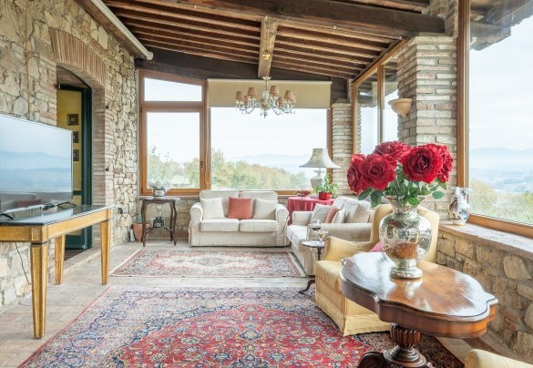 Il porticato verandato con area tv - Casale delle Farfalle