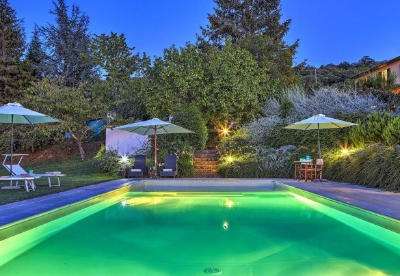 The pool takes on a new charm at sunset – Casale Le Conce 