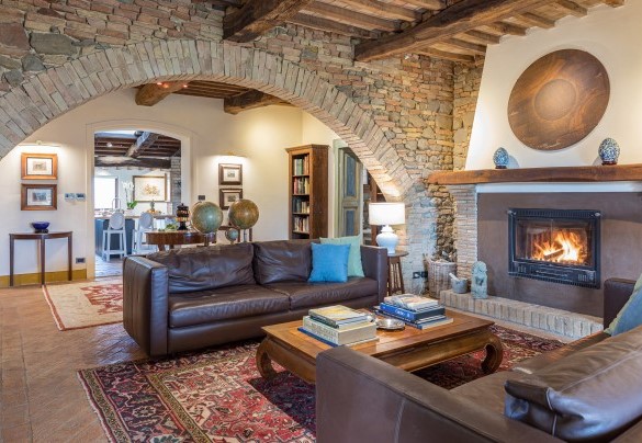 The living room open with the kitchen and dining area - Casale Santa Lucia   