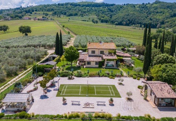 The Umbrian green rolling hills, studded with olive groves, fields of apple trees and vines surround the property - Casale Santa Lucia