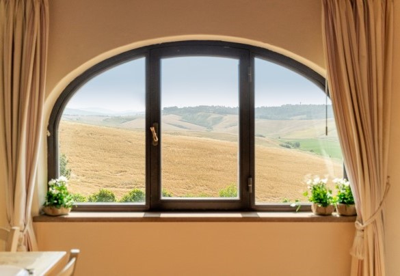 Window with panoramic view from the dining room- Casale Teatro