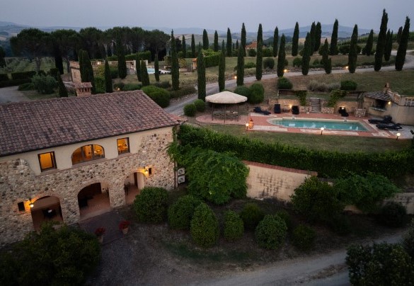 The property at sunset with a typical cypress-lined driveway- Casale Teatro