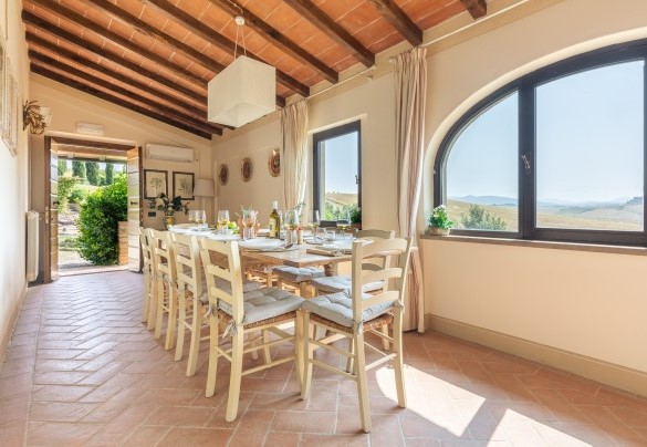 The dining room connected to the kitchen on the ground floor- Casale Teatro