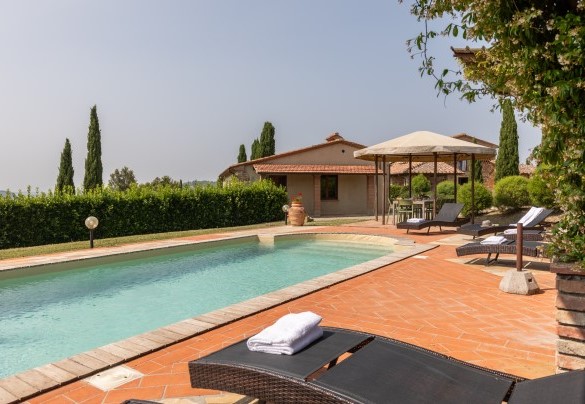 Comfortable sunbeds are available to guests in the solarium area around the pool- Casale Teatro