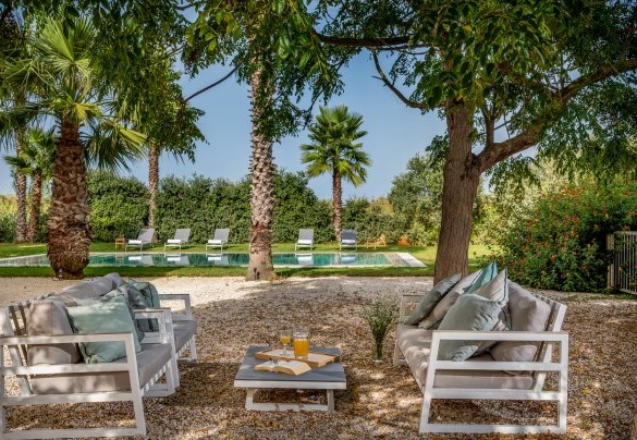 Rilassante zona salotto esterna in giardino - Casavento Puzzitteddu