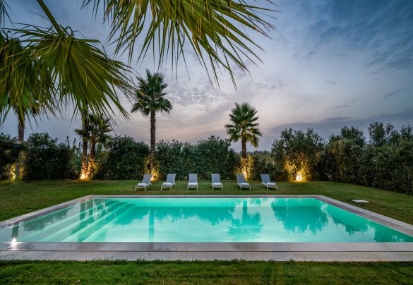 La piscina al tramonto - Casavento Puzzitteddu