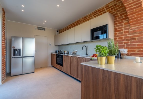 Kitchen with large fridge- Cascina Buzio