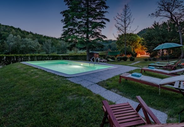 The sunbathing area illuminated by the last evening lights - Cascina La Valle