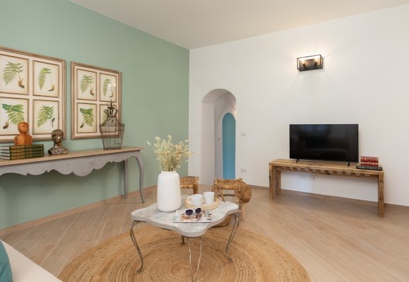 Il salotto con TV nell’unità 1 al piano terra – Casolare San Martino