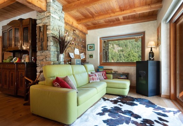Il legno e la pietra a vista sono gli elementi caratteristici e predominanti tanto all’esterno quanto all’interno - Chalet Walser