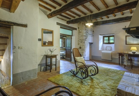 Hallway on the first floor with relaxation area and view of the Double bedroom with added single bed 6 on the first floor - Checello