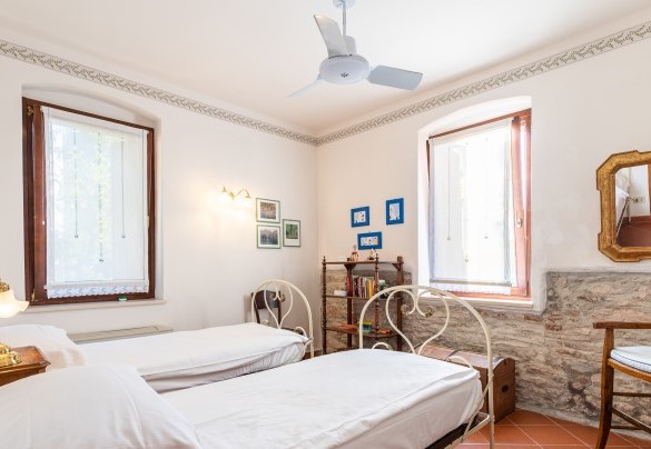 The bedroom with two single beds - Corazza
