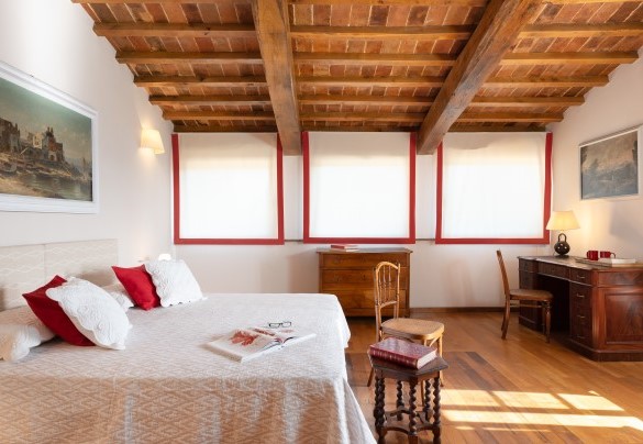 The double bedroom with dividable beds on the loft floor - Cosciano