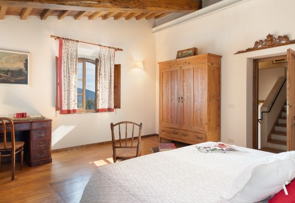 The double bedroom with dividable beds on the loft floor - Cosciano