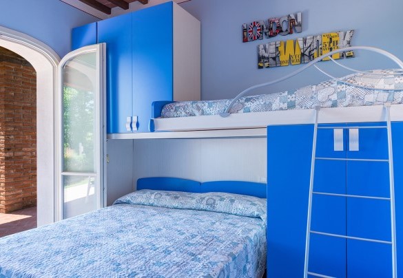 La camera matrimoniale con letto a castello al piano terra – Dimora San Jacopo 