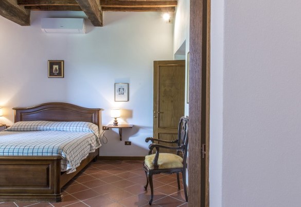 La meravigliosa camera matrimoniale al primo piano - Fattoria L'Olmo Rosso