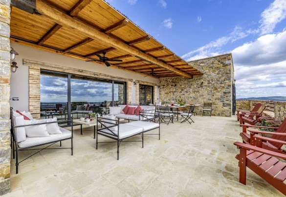 On the shaded terrace overlooking the pool are the dining and living areas - I Tramonti