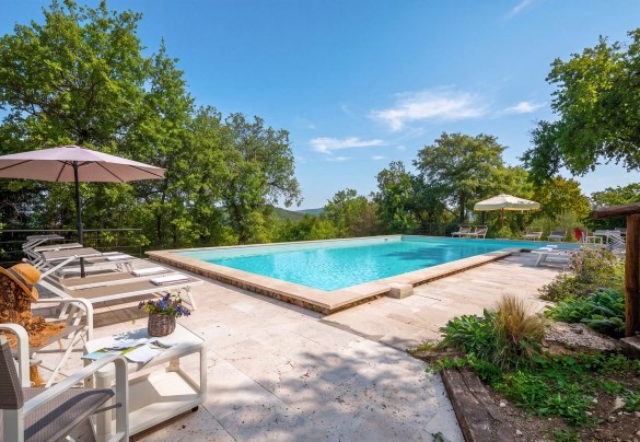 The harmony of the Crete Senesi landscape can be enjoyed from the panoramic swimming pool - Il Castellare