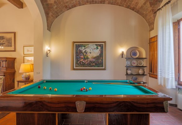 The billiard table in the main living room on the ground floor – Il Cerreto
