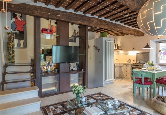 The ground floor is accessed along a flight of 6 steps that lead into an open-plan – Il Nido