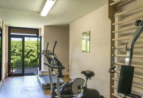 The gym with various exercise machines - Il Vignale