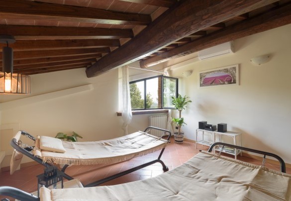 A relax room and a playground room for children – L’Ovile