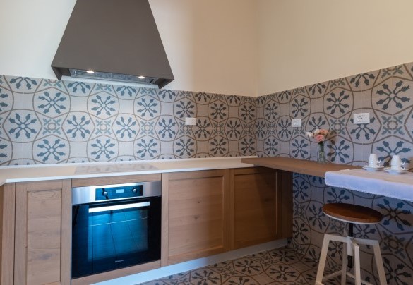The modern kitchen on the upper floor - La Buona Maniera